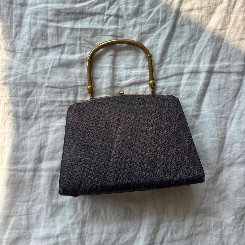 Vintage woven straw handbag with